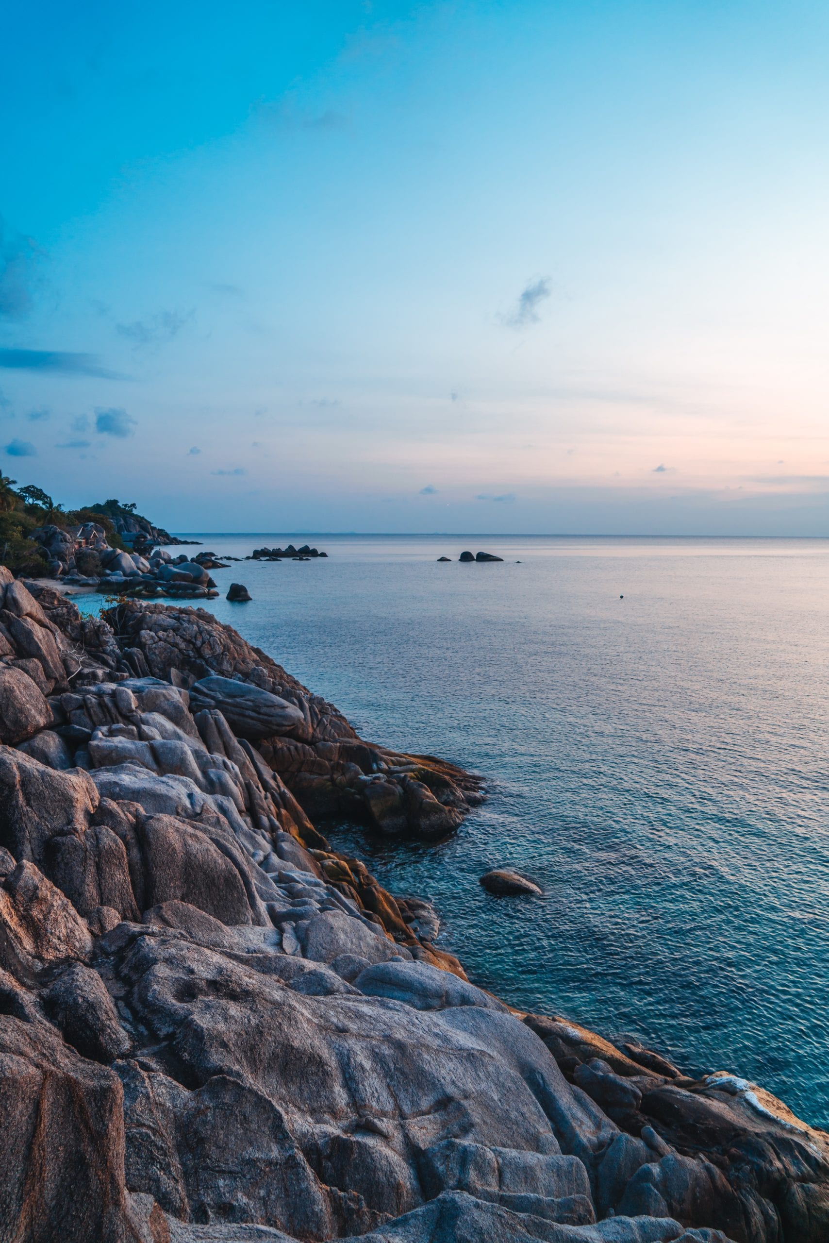 Granite boulders on a Koh Tao ridge, hot underfoot by mid-morning